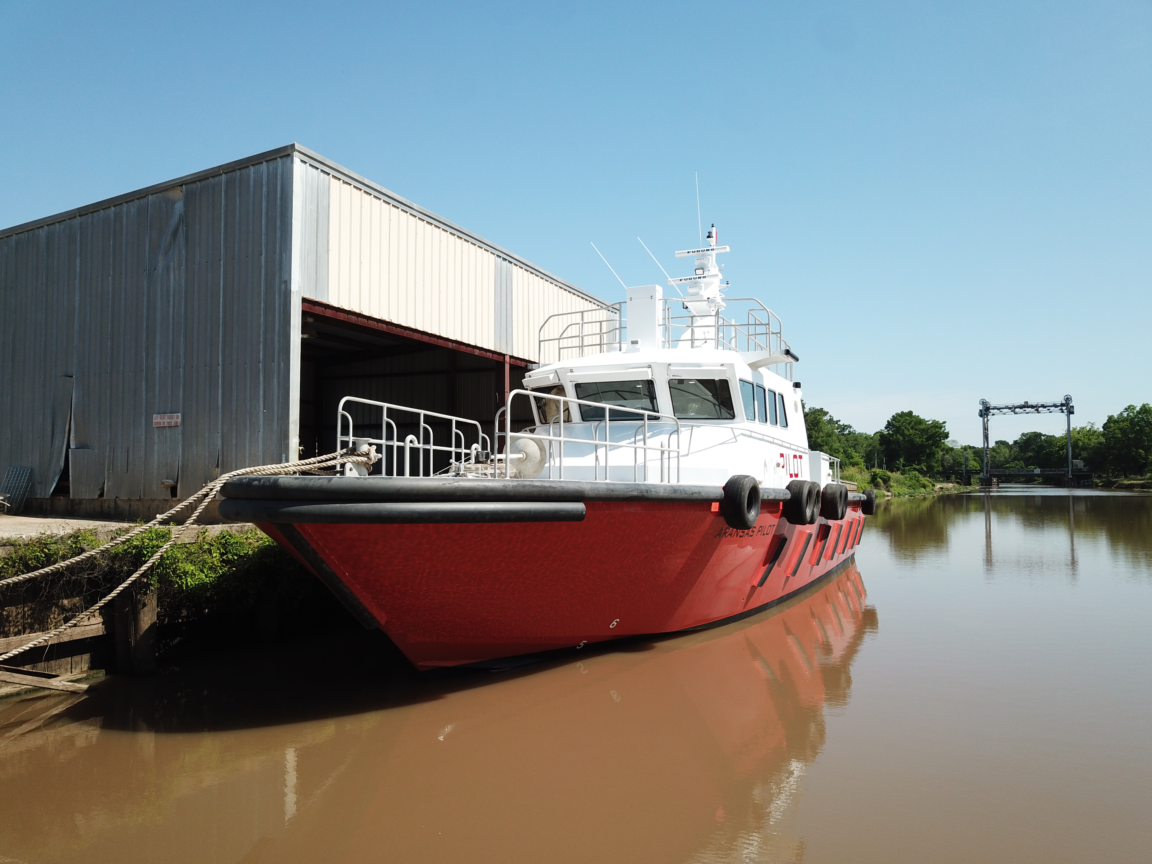 A Breaux's Bay Craft pilot boat moored at the shipyard dock