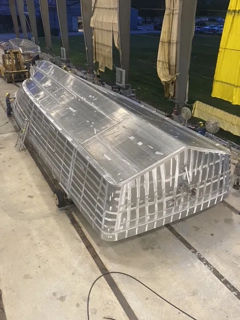 Aransas Pilot III inverted aluminum hull during fabrication